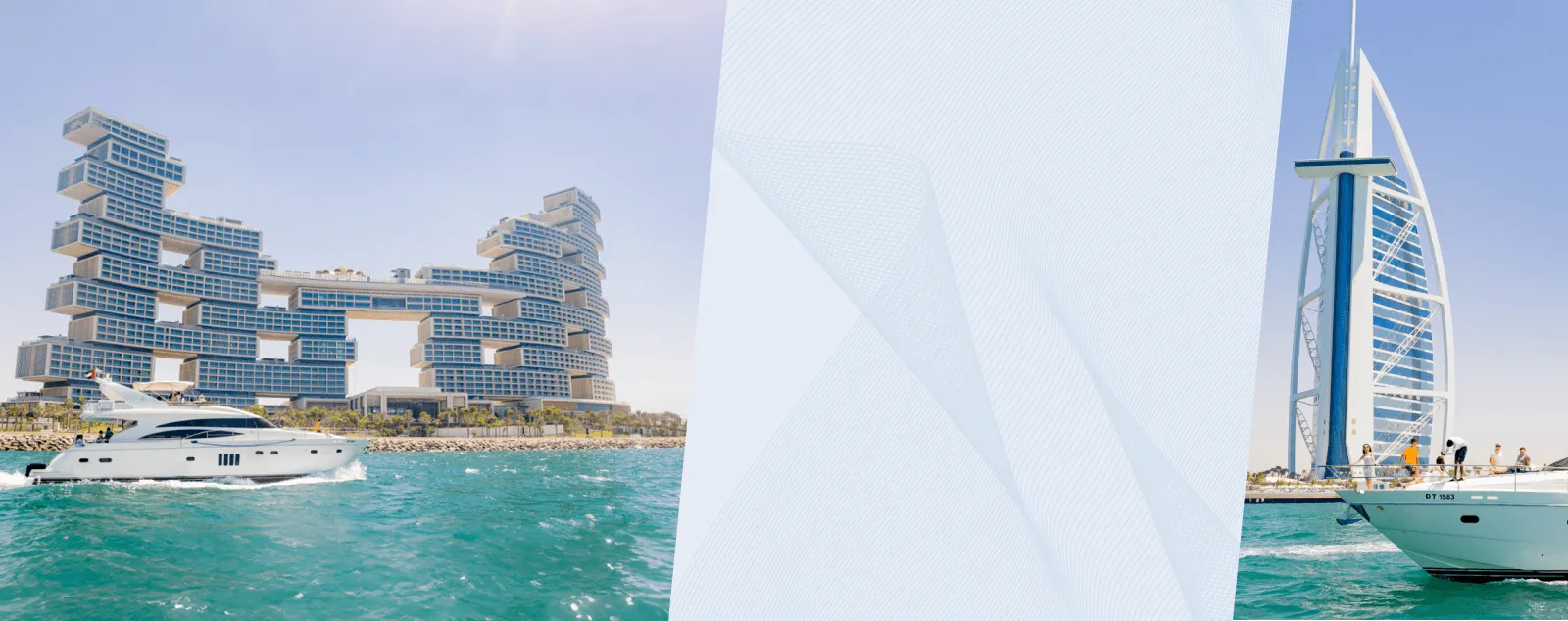 A luxury yacht full of tourists cruising past the waters near Atlantis The Royal in Dubai